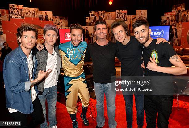 Louis Tomlinson, Niall Horan, Liam Payne, Simon Cowell, Harry Styles, and Zayn Malik on set during One Direction celebrates 1D Day at YouTube Space...