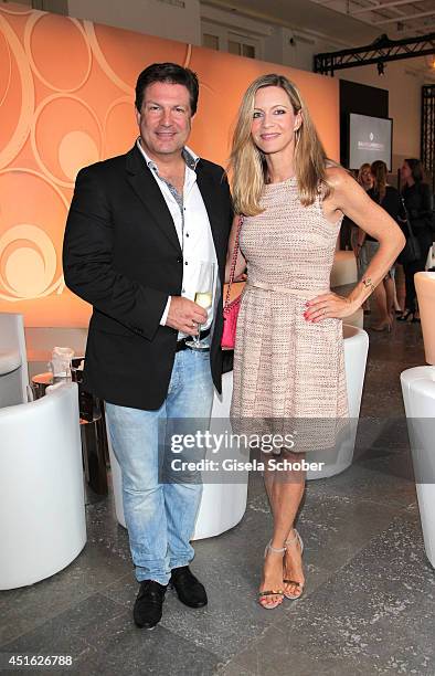 Francis Fulton Smith and his wife Verena Klein attend the presentation of the Baume & Mercier 'Promesse' Ladies Collection at Haus der Kunst on July...