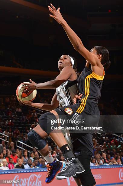 Sugar Rodgers of the New York Liberty goes up for a shot against the Tulsa Shock on July 1, 2014 at Madison Square Garden in New York, New York. NOTE...