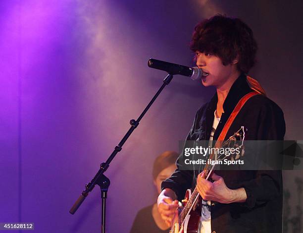 Jung Joon-Young performs onstage during his new album 'TEENAGER' showcase at IFC Mall on June 26, 2014 in Seoul, South Korea.