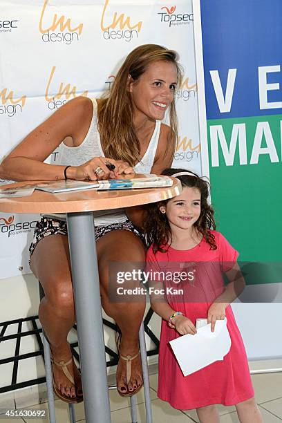 Laure Manaudou attends The 'Laure Manaudou Design' Swimming Suit show at Piscine Billancourt on July 2, 2014 in Paris, France.