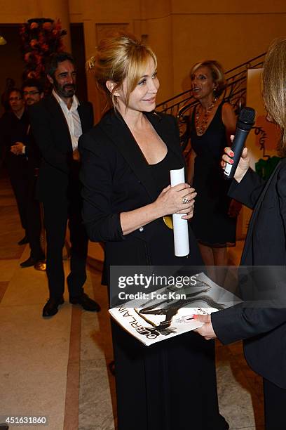 Emmanuelle Beart attends the '20th Amnesty International France' : Gala At Theatre Des champs Elysees on July 2, 2014 in Paris, France.