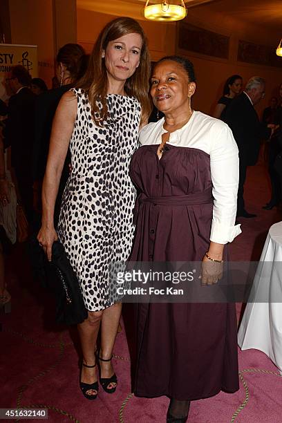 Anne Gravoin and Christiane Taubira attend the '20th Amnesty International France' : Gala At Theatre Des champs Elysees on July 2, 2014 in Paris,...