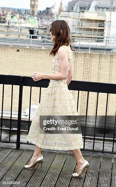 Keira Knightley attends a photocall for "Begin Again" on July 2, 2014 in London, England.