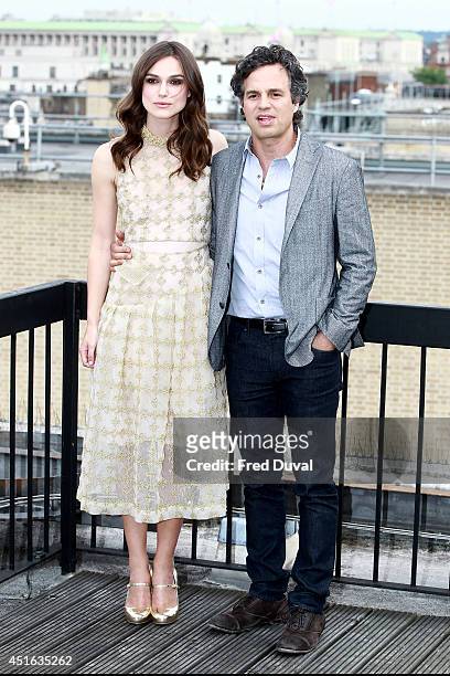 Keira Knightley and Mark Ruffalo attends a photocall for "Begin Again" on July 2, 2014 in London, England.