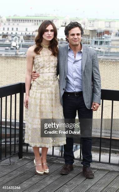 Keira Knightley and Mark Ruffalo attends a photocall for "Begin Again" on July 2, 2014 in London, England.