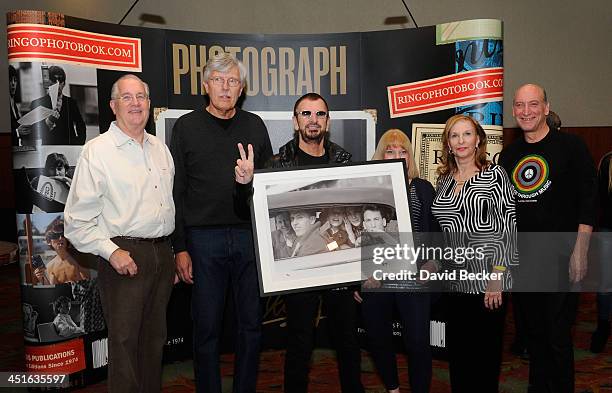 Recording artist Ringo Starr appears during a photo exhibition with subjects of his 1964 photograph "Kids in the Car" Bob Toth, Gary Van Deursen,...