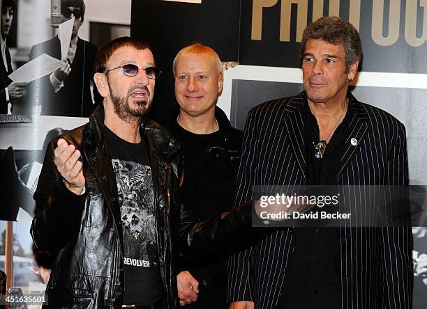 Recording artist Ringo Starr, drummer Gregg Bissonette, and musician Mark Rivera appear at an photo exhibition of Starr's photography work at the...