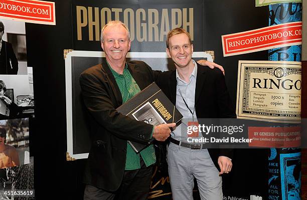 David Hedley and Genesis Publications Publisher Nicholas Roylance appear at a photo exhibition at the Palms Casino Resort on November 23, 2013 in Las...