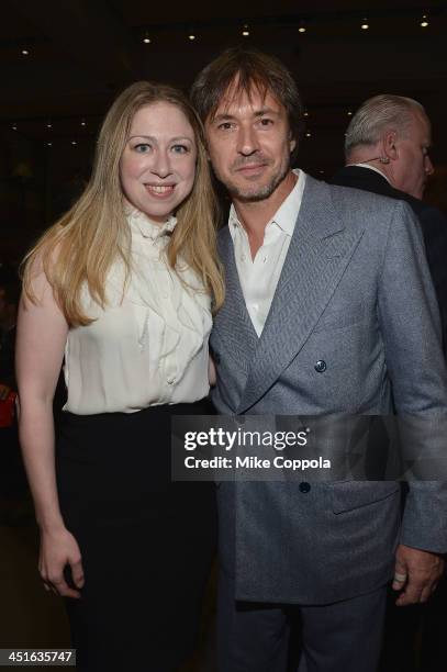 Chelsea Clinton and Marc Newson attend Jony And Marc's Auction at Sotheby's on November 23, 2013 in New York City.
