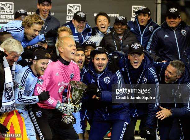 Captain Jimmy Nielsen of the Sporting KC celebrates with teammates after Sporting KC defeated the Houston Dynamo to win the Eastern Conference...