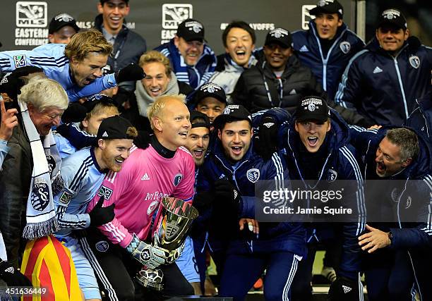 Captain Jimmy Nielsen of the Sporting KC celebrates with teammates after Sporting KC defeated the Houston Dynamo to win the Eastern Conference...