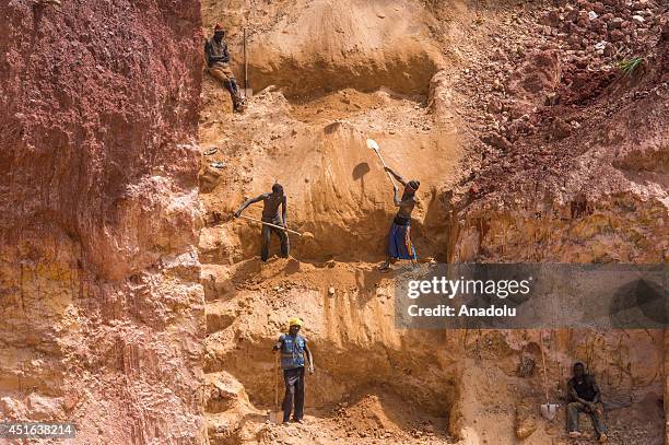 Gold miners in Ndassima gold mine, 40 Km of Bambari, in Seleka group controlled zone, in the Eastern part of CAR. Independent gold panners run the...