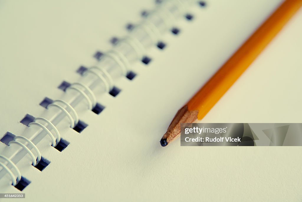 Notebook and pencil
