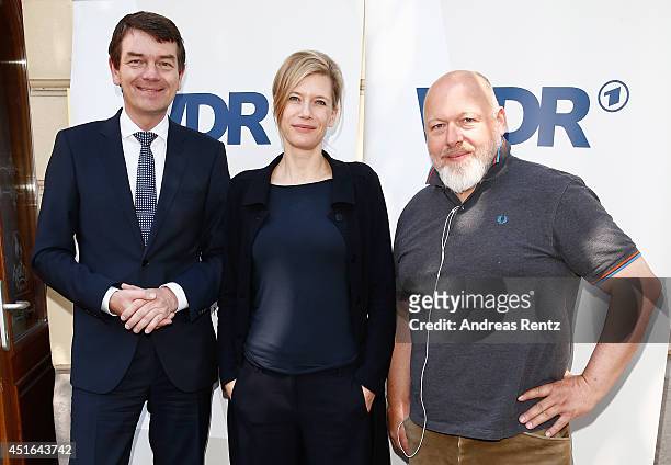 Program director Joerg Schoenenborn, actress Ina Weisse and director Rainer Kaufmann attend the WDR Reception at Teatro Bar Tapas on July 3, 2014 in...