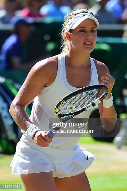 Canada's Eugenie Bouchard celebrates winning her women's singles semi-final match against Romania's Simona Halep on day ten of the 2014 Wimbledon...