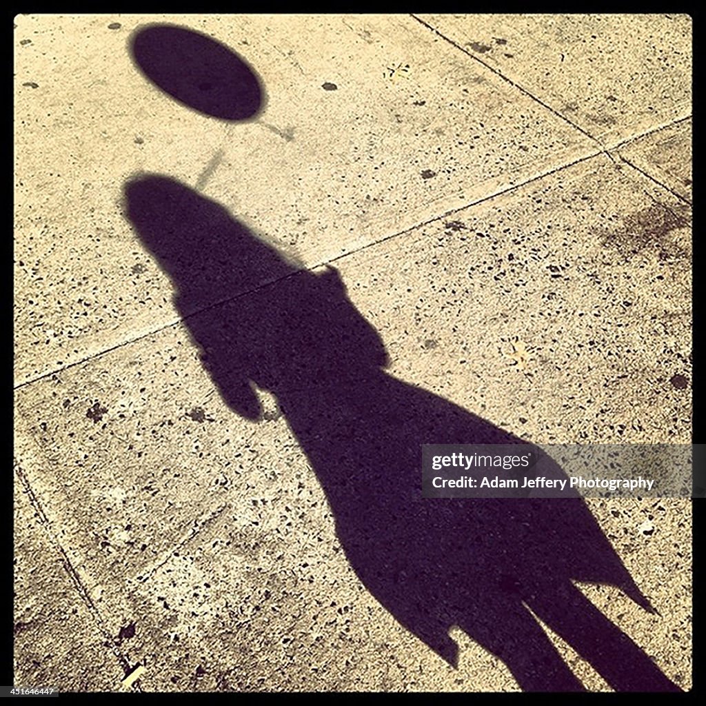 Shadow of a girl with balloon