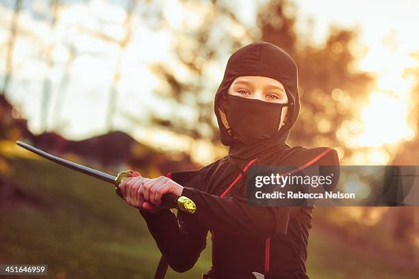 little ninja - ninja kid stock pictures, royalty-free photos & images