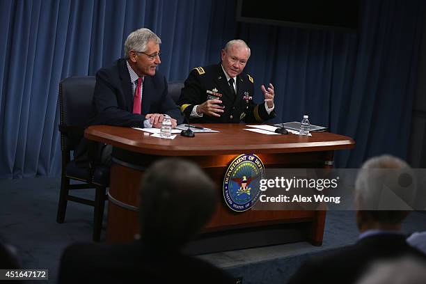 Secretary of Defense Chuck Hagel and Chairman of the Joint Chiefs of Staff Gen. Martin Dempsey brief members of the media July 3, 2014 at the...