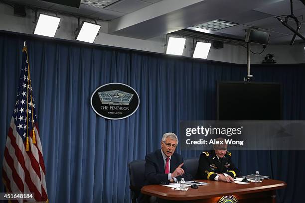 Secretary of Defense Chuck Hagel and Chairman of the Joint Chiefs of Staff Gen. Martin Dempsey brief members of the media July 3, 2014 at the...