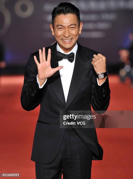 Actor Andy Lau arrives on the red carpet of the 50th Golden Horse Awards at Sun Yat-sen Memorial Hall on November 23, 2013 in Taipei, Taiwan.