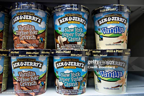 Ben & Jerry's brand ice cream sits in a supermarket freezer in Princeton, Illinois, U.S., on Wednesday, July 2, 2014. Rising prices for beef, ice...