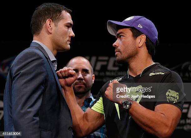 Opponents Chris Weidman and Lyoto Machida face off during the UFC Ultimate Media Day at the Mandalay Bay Resort and Casino on July 3, 2014 in Las...