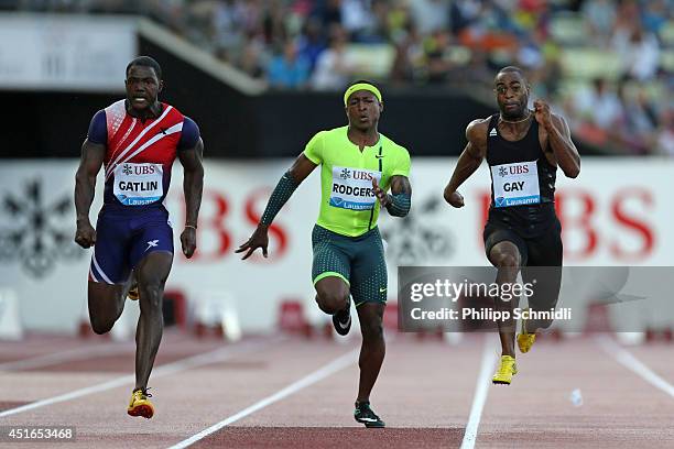 Justin Gatlin of USA , Michael Rodgers of USA and Tyson Gay of USA compete in the Men's 100m race at the IAAF Diamond League Athletics meeting...