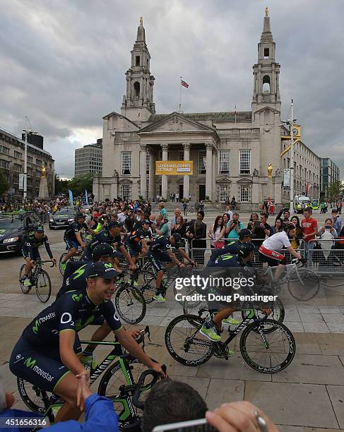 Team Movistar is greeted by supporters as they ride through Millenium Square enroute to the Team Presentation prior to the 2014 Le Tour de France on...