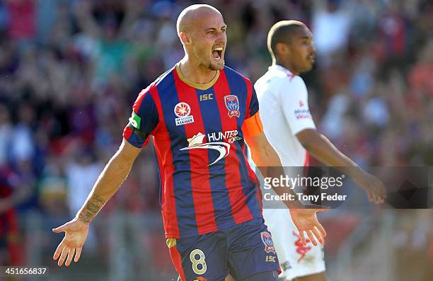 Ruben Zadkovich of the Jets celebrates a a team mates goal during the round seven A-League match between the Newcastle Jets and the Melbourne Heart...