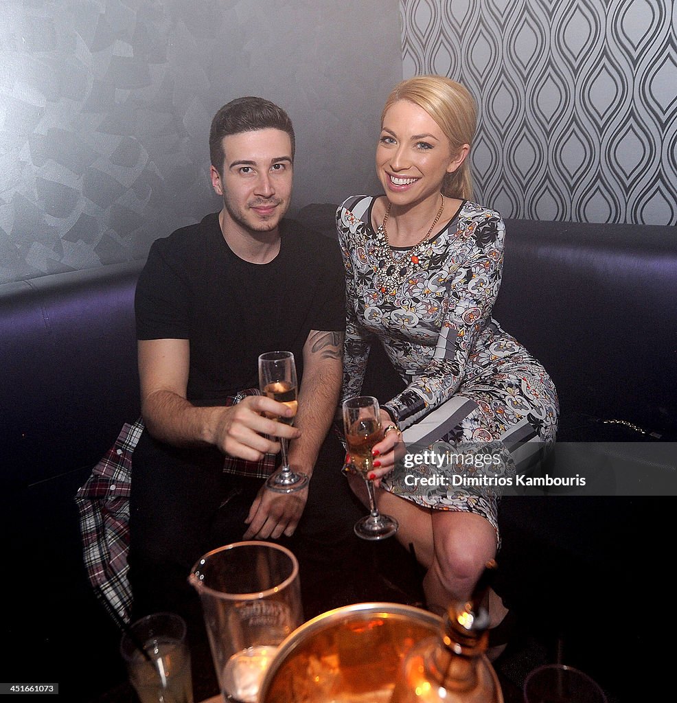 Vinny Guadagnino and Stassi Schroeder attend the Grand Opening of