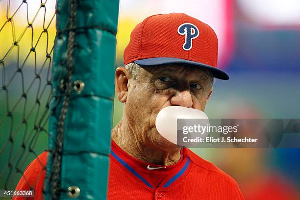 Bench coach Larry Bowa of the Philadelphia Phillies gets ready for batting practice prior to the start of the game against the Miami Marlins at...