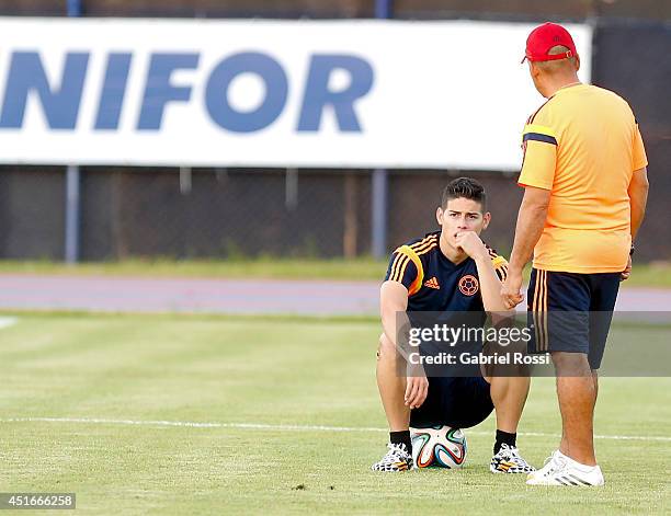 James Rodriguez of Colombia looks on during a training session at Universidad de Fortaleza Stadium on July 03, 2014 in Fortaleza, Brazil. Colombia...