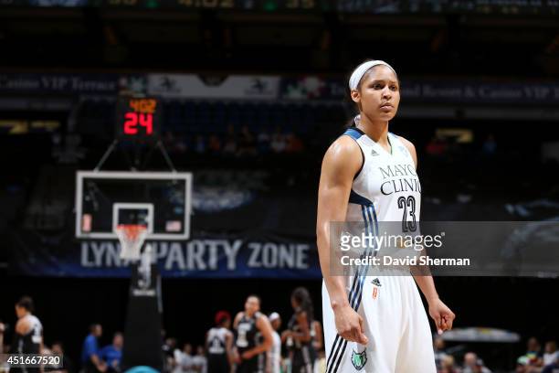 Maya Moore of the Minnesota Lynx stands on the court during a game against the San Antonio Stars on July 3, 2014 at Target Center in Minneapolis,...