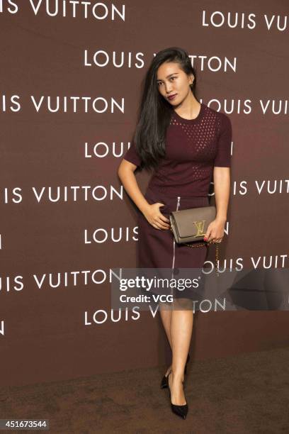 Chinese model Lv Yan poses as she arrives at the opening ceremony for a new  store of Louis Vuitton in Chengdu city, southwest Chinas Sichuan province  Stock Photo - Alamy