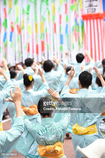 Japanese woman dressed in traditional costume perform dance during the Shonan Hiratsuka Tanabata Festival on July 4, 2014 in Hiratsuka, Japan....