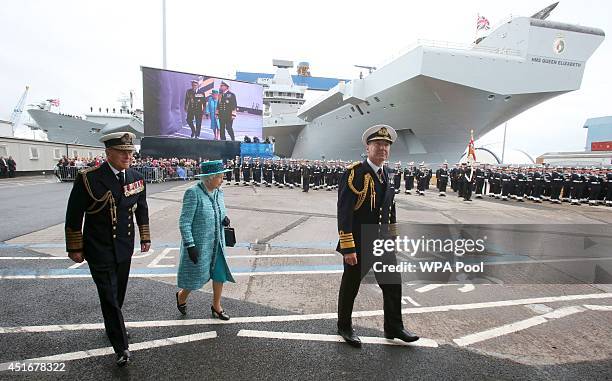 Queen Elizabeth II and the Prince Philip, Duke of Edinbugh arrive at HMS Queen Elizabeth in Rosyth Dockyard where she will formally name the Royal...