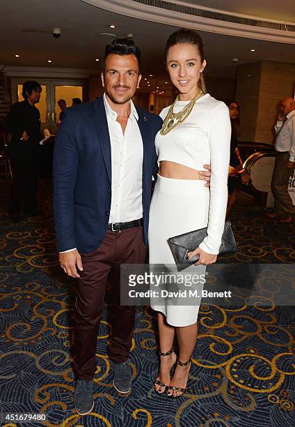 Peter Andre Emily Macdonagh attends the Nordoff Robbins 02 Silver Clef awards at the London Hilton on July 4, 2014 in London, England.