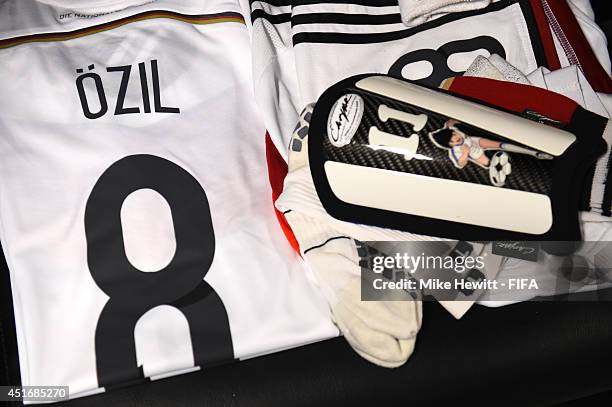 The kit worn by Mesut Oezil of Germany is displayed in the dressing room prior to the 2014 FIFA World Cup Brazil Quarter Final match between France...