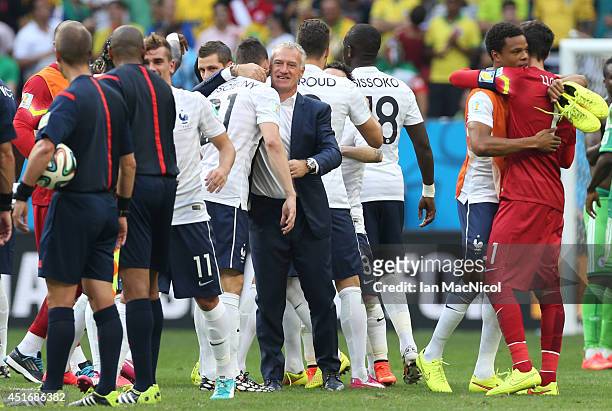 France coach Didier Deschamps hugs Laurent Koscielny of France during the 2014 FIFA World Cup Brazil Round of 16 match between France and Nigeria at...
