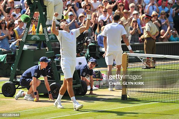 Serbia's Novak Djokovic celebrates winning his men's singles semi-final match against Bulgaria's Grigor Dimitrov on day 11 of the 2014 Wimbledon...