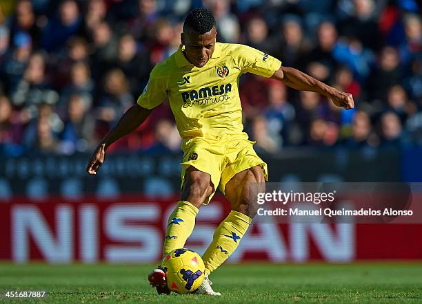 Ikechukwu Uche of Villarreal shoots during the La Liga match between Levante UD and Villarreal CF at Ciutat de Valencia on November 24, 2013 in...