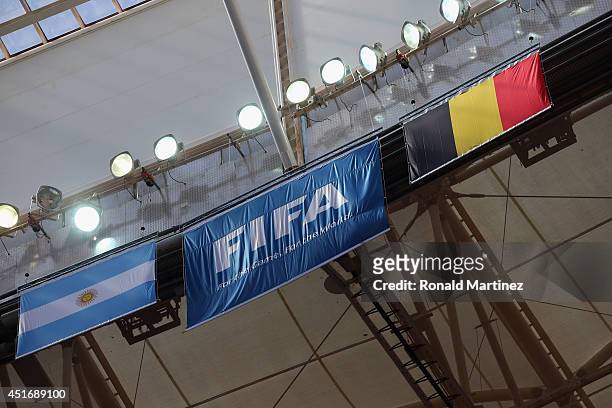 The flags of Argentina and Belgium during a training session at Estadio Nacional on July 4, 2014 in Brasilia, Brazil.