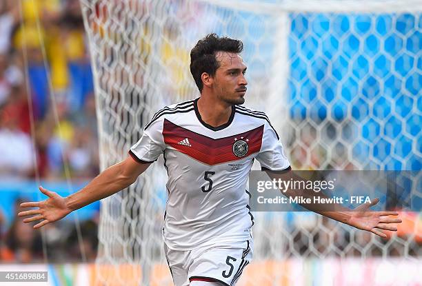 Mats Hummels of Germany celebates scoring his team's first goal during the 2014 FIFA World Cup Brazil Quarter Final match between France and Germany...