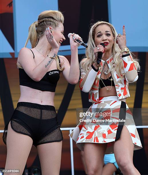 Iggy Azalea and Rita Ora perform on stage at Wireless Festival at Finsbury Park on July 4, 2014 in London, United Kingdom.