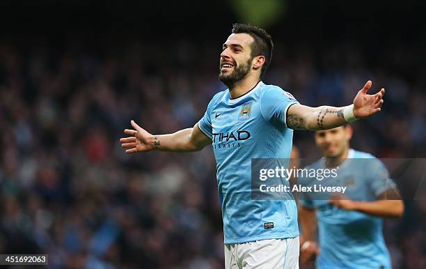 Alvaro Negredo of Manchester City celebrates his team's fifth goal during the Barclays Premier League match between Manchester City and Tottenham...