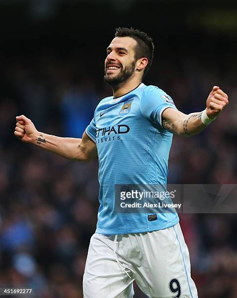 Alvaro Negredo of Manchester City celebrates his team's fifth goal during the Barclays Premier League match between Manchester City and Tottenham...