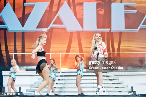 Iggy Azalea and Rita Ora perform on stage at Wireless Festival at Finsbury Park on July 4, 2014 in London, United Kingdom.