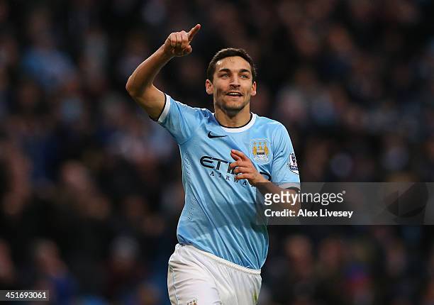Jesus Navas of Manchester City celebrates after scoring the sixth goal during the Barclays Premier League match between Manchester City and Tottenham...