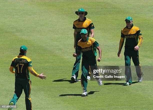 The Proteas celebrate a wicket during the 1st One Day International match between South Africa and Pakistan at Sahara Park Newlands on November 24,...
